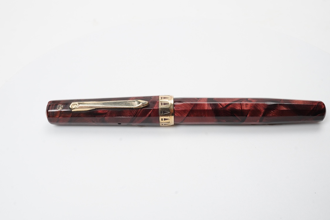 A Wahl Eversharp lever fill 'Doric' fountain pen in garnet colour with gold filled trim